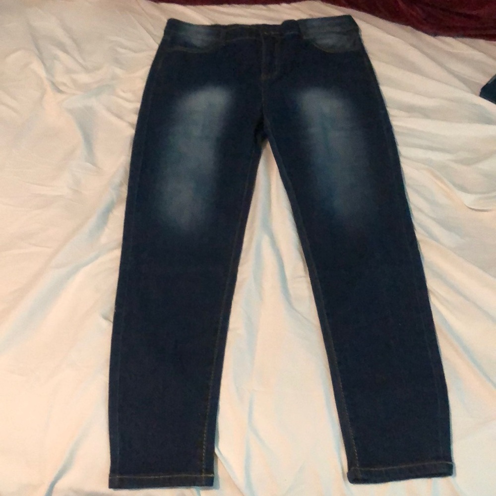 I’m selling three new pairs of jeans for women. All three size large.